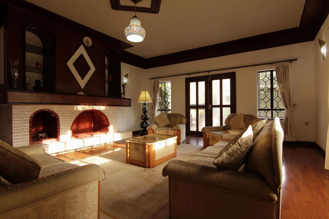 Living room with six-metre ceiling and pendant lighting
